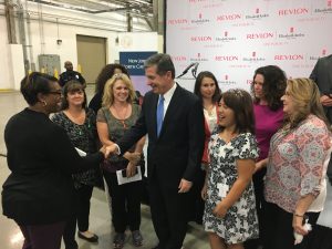 Governor Roy Cooper greets Revlon employees.